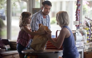 safe haven still 300x190 Movie Review: Safe Haven, Like a Clichéd Valentine’s Day Date, Fails to Meet Expectations 
